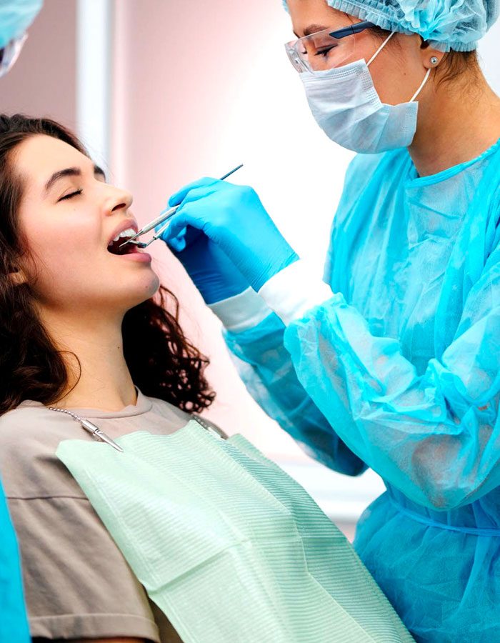 General & Preventive Dentistry in Dbayeh, Lebanon Dentist giving a patient a routine dental check-up at C.Metric in Dbayeh